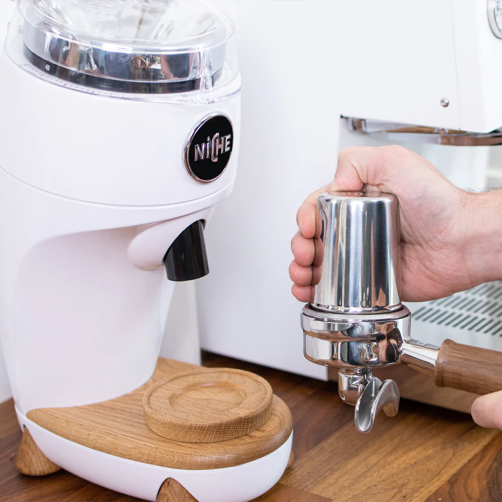 Niche Duo grinder showing oak wood accents and stepless grind dial
